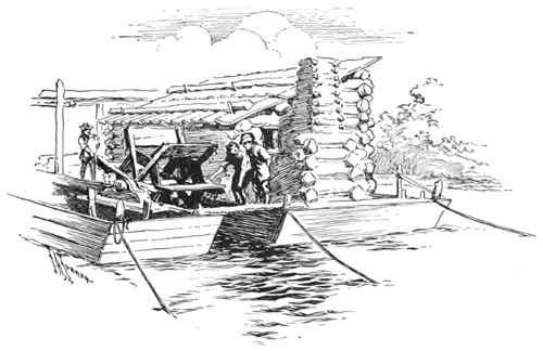 a watermill between two flatboats
